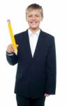 School Boy Holding Pencil Stock Photo