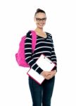 Smiling College Girl Carrying Bag Stock Photo