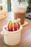 Small Cactus Pot On Wooden Table Stock Photo