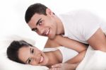 Couple Having Fun In Bed Stock Photo