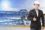 Environmental Engineering Man Standing In Front Of Waterworks In Stock Photo