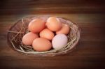 Fresh Eggs In Bamboo Basket Stock Photo