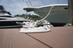 White Rope With Mooring Bollard Stock Photo