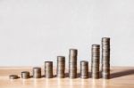 Columns Of Coins On The Table Stock Photo