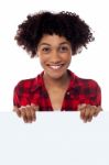 Smiling Woman Standing Behind Blank Whiteboard Stock Photo