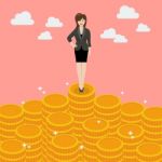 Business Woman Standing On Money Stock Photo