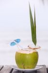 Coconut Water Drink Served In Coconut With Drinking Straw On The Stock Photo