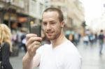 Man Taking Photo With Mobile Phone Stock Photo