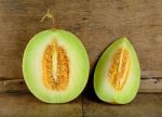 Cantaloupe Melon On The Wooden Background Stock Photo