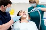 Female Patient At Dental Clinic For Treatment Stock Photo