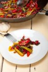 Fried Chili Pepper And Vegetable On A Wok Pan Stock Photo