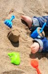 Baby On The Beach Stock Photo