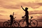 Silhouette Biker Family Stock Photo