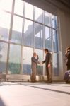 Business People Shaking Hands Stock Photo