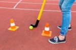 Hockey Player With Stick Ball And Pawns Stock Photo