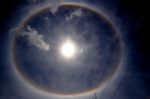 Sun With Circular Rainbow Stock Photo