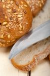 Organic Bread Over Rustic Table Stock Photo