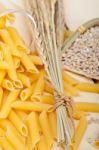 Italian Pasta Penne With Wheat Stock Photo