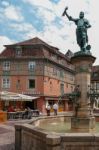 Statue And A Fountain In A Square In Colmar Stock Photo