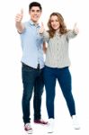 Attractive Couple Showing Thumbs Up Stock Photo