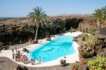 People Walking Round The Swimming Pool At Jameos Del Agua In Lan Stock Photo