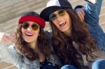 Young Beautiful Girls With Denim Suit In A Urban Background Stock Photo