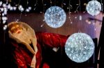 Santa Claus With White Light Balls Stock Photo