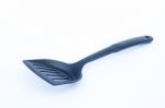 Black Plastic Kitchen Spatula On White Background Stock Photo