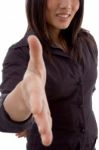 Smiling Woman Offering Handshake Stock Photo