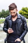 Young Man Texting Stock Photo