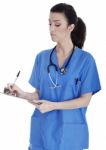 Friendly Nurse Making Medical Notes Stock Photo