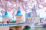 Seoul, Korea - April 9, 2015: Lotte World Amusement Park At Night And Cherry Blossom Of Spring, A Major Tourist Attraction In Seoul, South Korea On April 9, 2015 Stock Photo