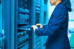 Man Fix Server Network In Data Center Room Stock Photo