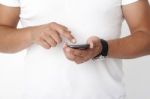 Hands Of A Man Using A Smartphone Stock Photo