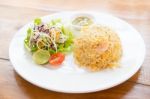 Fried Rice With Shrimp And Salad Stock Photo