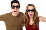 Excited Boy And Girl Cheering Loudly Stock Photo