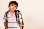 Portrait Of Young Schoolboy Looking Away Stock Photo