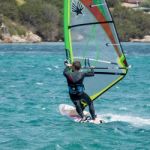 Windsurfing At Porto Pollo In Sardinia Stock Photo