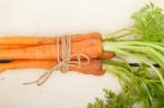 Baby Carrots Bunch Tied With Rope Stock Photo