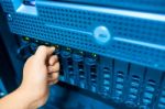 Man Fix Server Network In Data Center Room Stock Photo