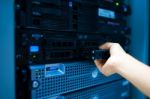 Man Fix Server Network In Data Center Room Stock Photo