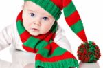 Baby With Christmas Hat And Scarf Stock Photo