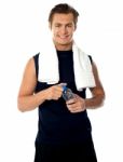 Athlete man holding Water Bottle Stock Photo