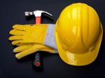 Hard Hat Hammer And Leather Gloves Stock Photo