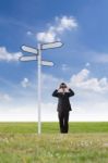 Businessman Using Binoculars Stock Photo