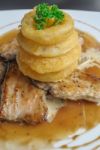 Roast Pork In Mushroom Sauce Stock Photo