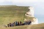 School Trip Pausing Before The Ascent On The South Downs At Beac Stock Photo