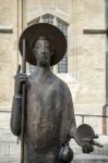 Statue Of A Man Outside St James Church In Rothenburg Stock Photo