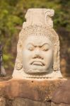 Statue Of Ancient Khmer Warrior Head At Angkor Wat Stock Photo