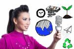 Asian Woman Holding Spiral Bulb Stock Photo